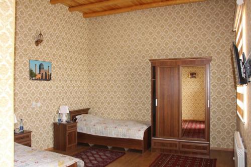 Ulli Hovli Hotel客房内的一张或多张床位