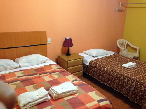 Hotel Sol de Huanchaco客房内的一张或多张床位