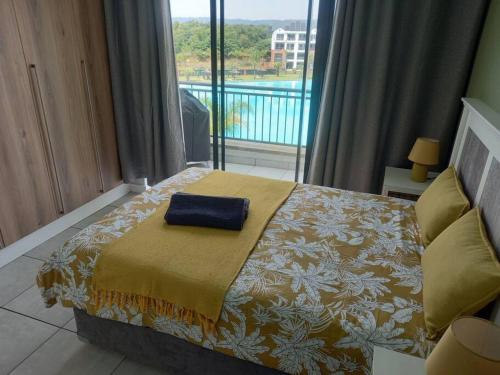 Breathtaking Lagoon View Apartment @ The Blyde1531客房内的一张或多张床位