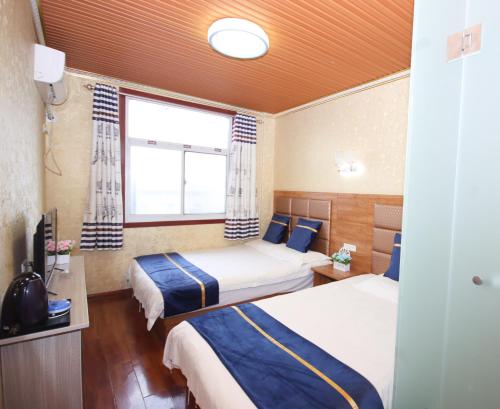 西安咸阳国际机场一米阳光酒店客房内的一张或多张床位