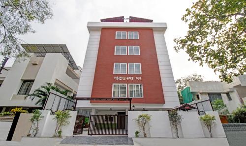 那格浦尔Treebo Trend Chandraprasth Residency的建筑物外形的 ⁇ 染