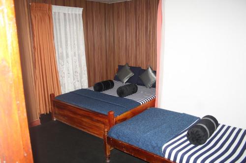 Bezel Bungalow Nuwara Eliya客房内的一张或多张床位