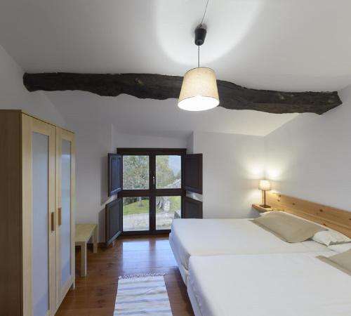 Casa de Aldea Casina del Naranjo客房内的一张或多张床位