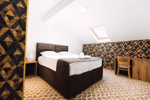 Hotel Livnica客房内的一张或多张床位