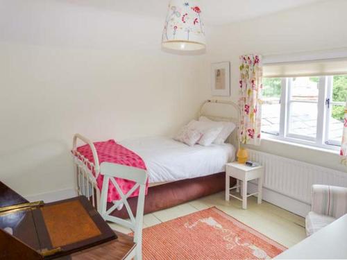 Woodhill Cottage客房内的一张或多张床位
