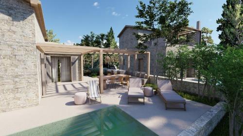 苏卡雷斯PAPADRIA VILLAS - Modern Luxury villas near Kathisma Beach的一个带桌椅的庭院和一个游泳池