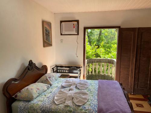 Rio Natureza apart 112客房内的一张或多张床位