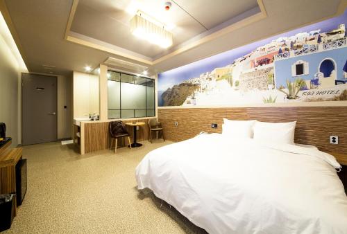 Jinju Kai Hotel客房内的一张或多张床位