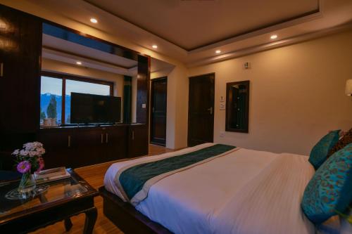 Hotel Ladakh Inn客房内的一张或多张床位