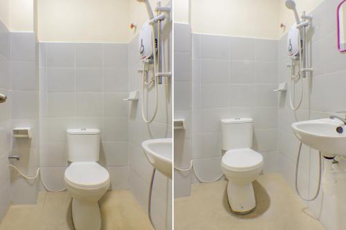 新山Super OYO 89985 Js Hotel的浴室设有2个卫生间和水槽