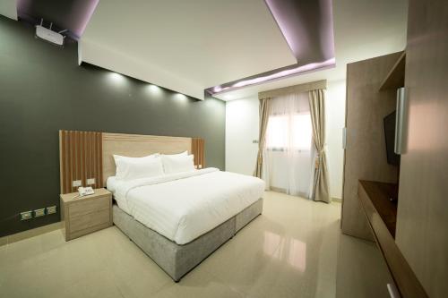 Mirada Gold Jizan - Resort & Private Pools客房内的一张或多张床位