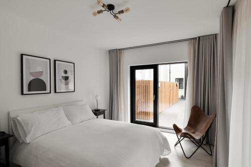 OneFiveSix - Unique Apartments客房内的一张或多张床位