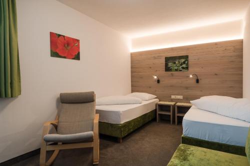 Hotel & Residence Rebhof客房内的一张或多张床位