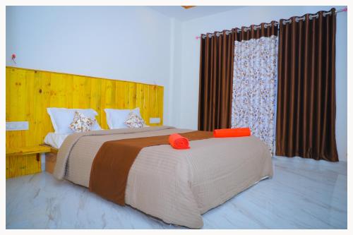 Sai Siddhigiri Villa客房内的一张或多张床位