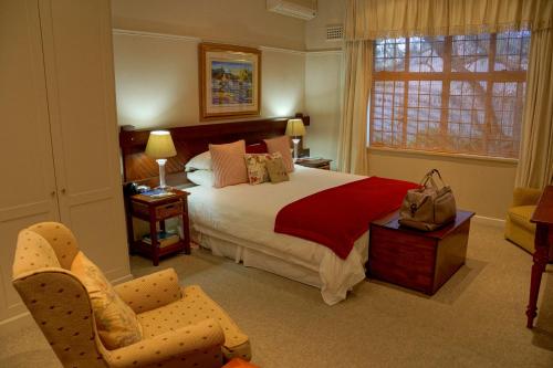 野生橄榄宾馆客房内的一张或多张床位