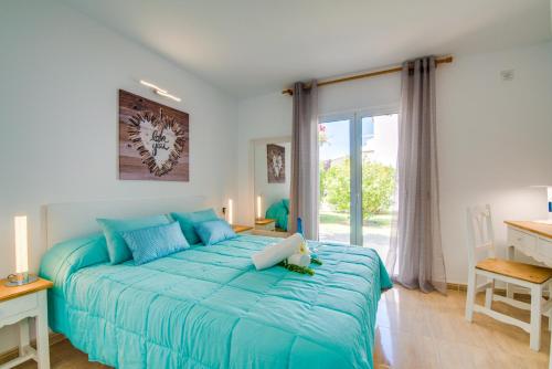 Ideal Property Mallorca - Avus客房内的一张或多张床位