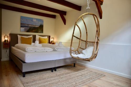 霍夫范玛斯酒店客房内的一张或多张床位