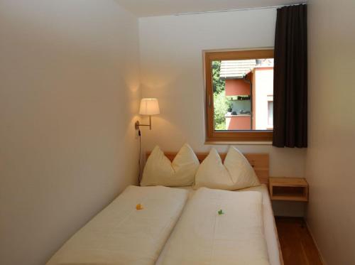 Bodensee-Ferienwohnung Am Ruggbach客房内的一张或多张床位