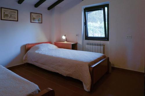Podere Il Pino客房内的一张或多张床位