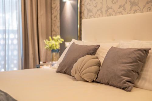Romagna Suite Hotel客房内的一张或多张床位
