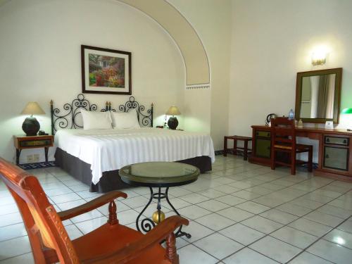 Hotel Concierge Plaza Colima客房内的一张或多张床位