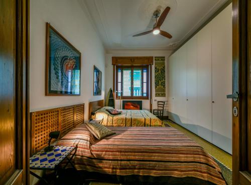 Castelletto Exclusive Terrace Penthouse客房内的一张或多张床位