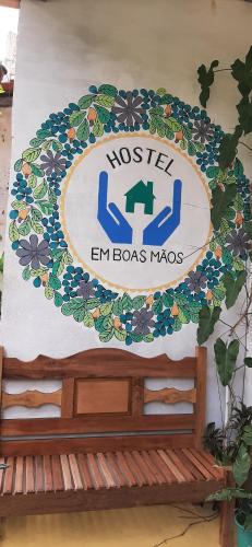 巴雷里尼亚斯Hostel Em Boas Mãos的点缀的符号