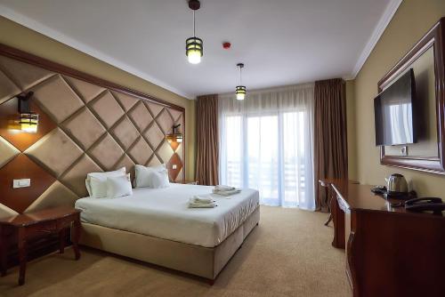 HOTEL ADRIANO客房内的一张或多张床位