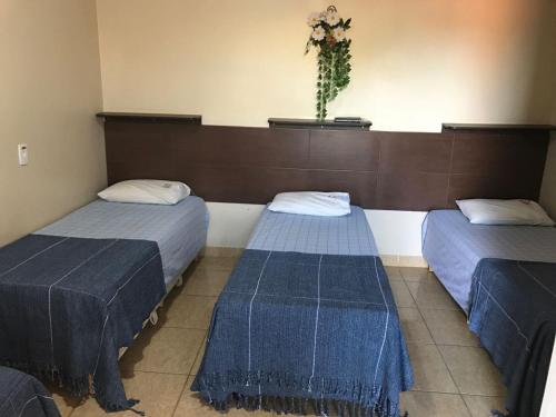 Recanto do Carreiro客房内的一张或多张床位