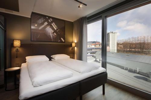 斯堪迪克瓦伦卡酒店客房内的一张或多张床位
