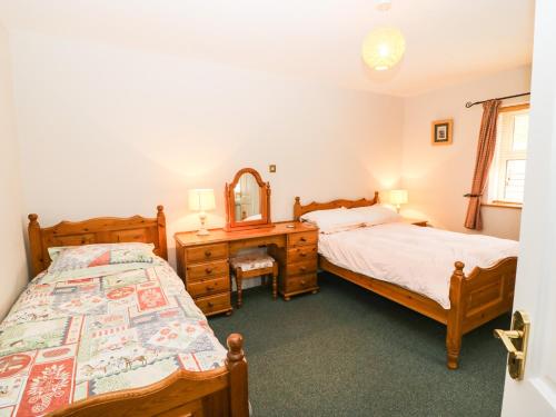 Lis-Ardagh Cottage 1客房内的一张或多张床位
