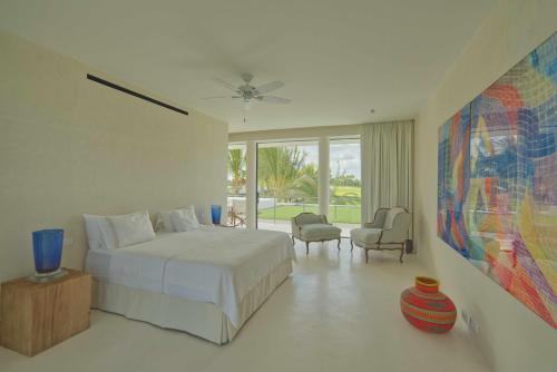 蓬塔卡纳Unique golf front villa with modern design in exclusive beach resort的相册照片