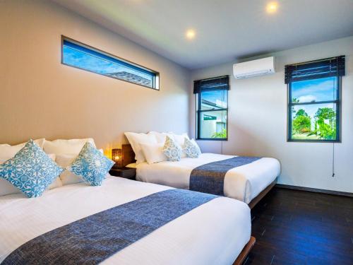 Grace Villa Miyakojima - Vacation STAY 60494v客房内的一张或多张床位