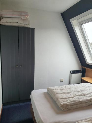 Borndiep Amelander Kaap 34客房内的一张或多张床位