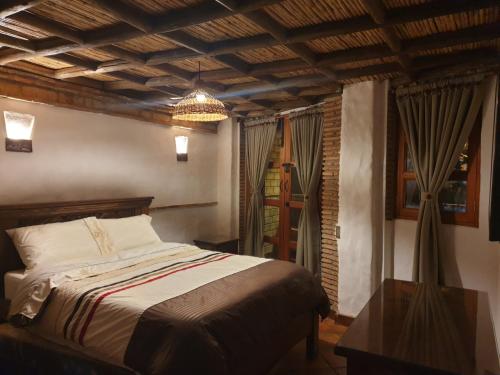Casona Real Santa Barbara客房内的一张或多张床位