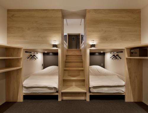 三条Piece旅舍客房内的一张或多张床位