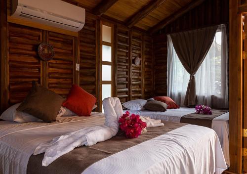 Eco-Turismo Guayacanes客房内的一张或多张床位