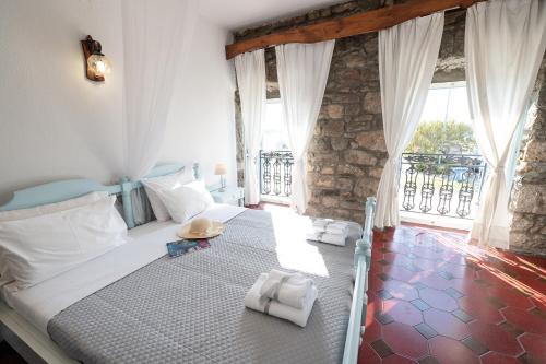 狄俄尼索斯酒店客房内的一张或多张床位