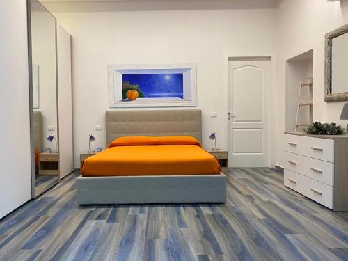 Appartamenti Acquazzurra客房内的一张或多张床位