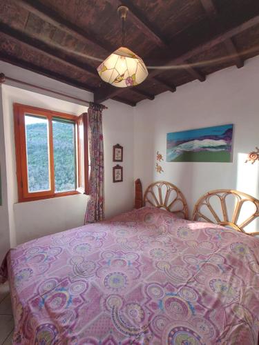 Casa Ferrini客房内的一张或多张床位