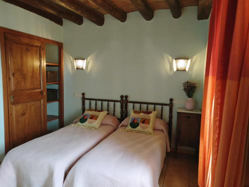 Casa Serra de Dalt客房内的一张或多张床位
