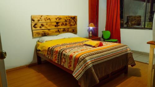 Kame House hostel客房内的一张或多张床位