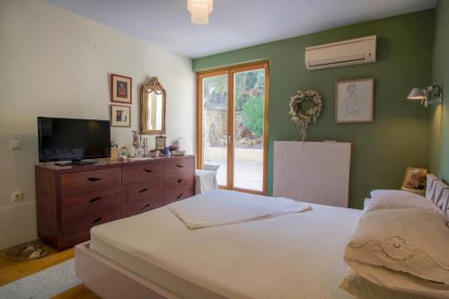 Heraklion-Knossos Luxury Home客房内的一张或多张床位