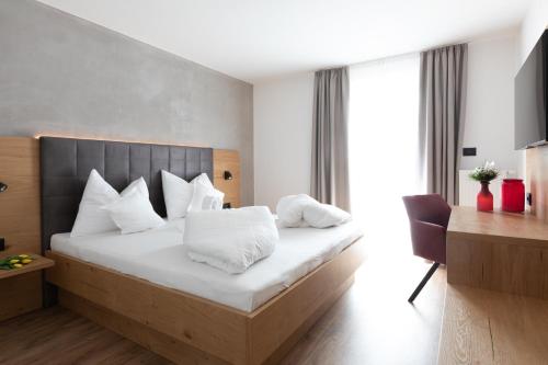 Garni-Hotel mir.es客房内的一张或多张床位