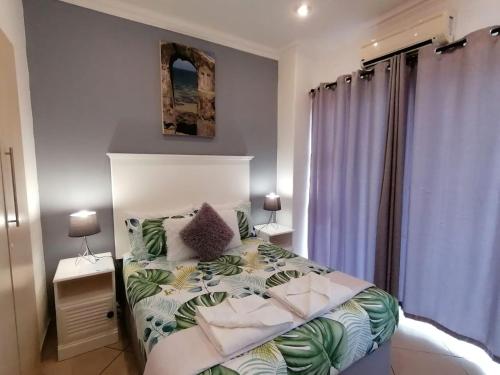 Palm View Guest House客房内的一张或多张床位