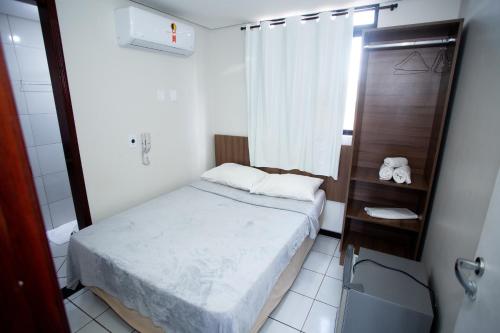 Hotel Campina Executivo客房内的一张或多张床位
