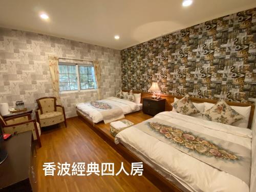 桂林香波咖啡城堡民宿客房内的一张或多张床位
