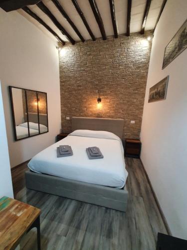 Residenza la Mandorla客房内的一张或多张床位