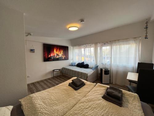 Fit-Relax Apartments Meersburg mit eigenem Sportstudio客房内的一张或多张床位