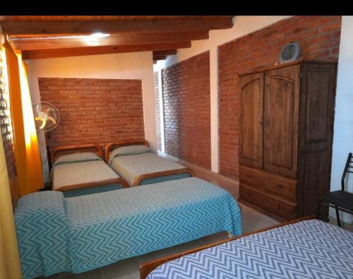 El Pasaje 2客房内的一张或多张床位
